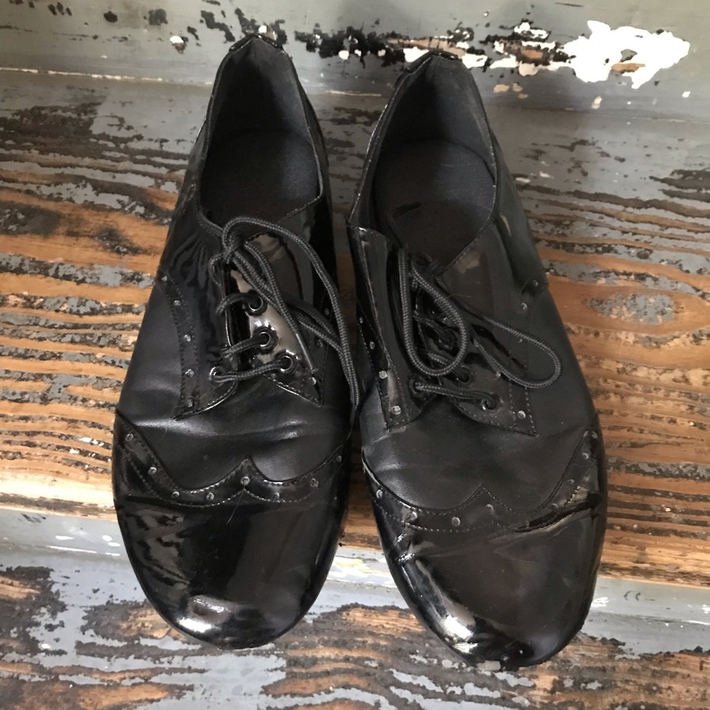 Black wingtip/spat style dance shoes